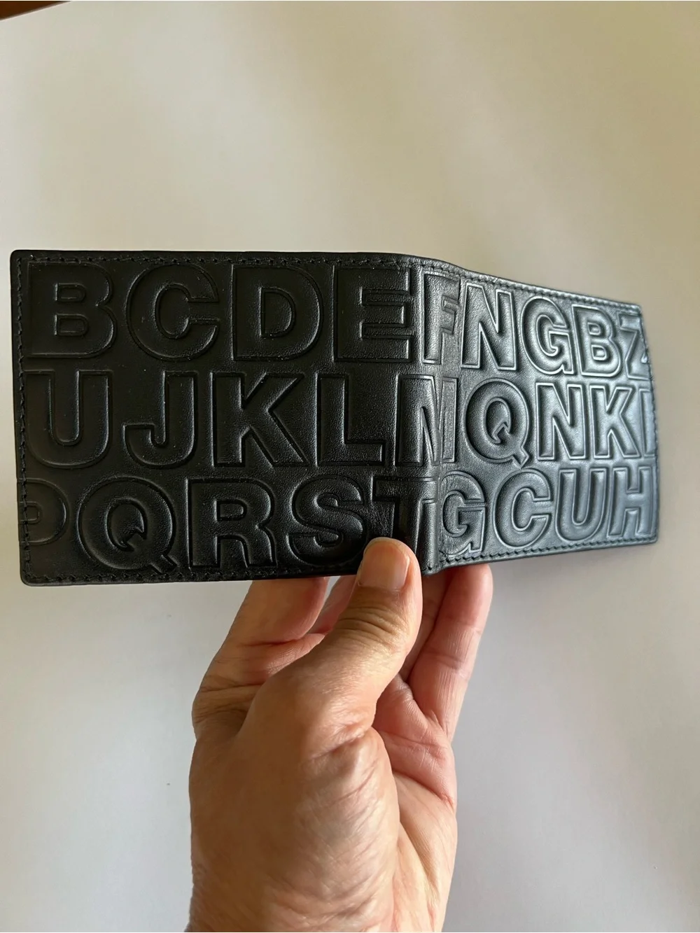 New Comme des Garcons Embossed Leather Wallet